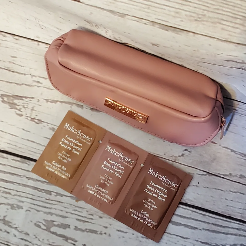 SeneGence pink vinyl makeup bag with foundation samples